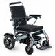 A black Mobility electric wheelchair with a lightweight aluminum frame, flip-up armrests, and a reclining seat.